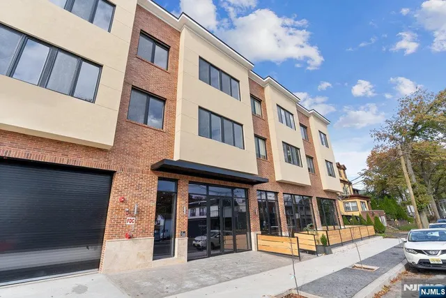 a front view of a building with street