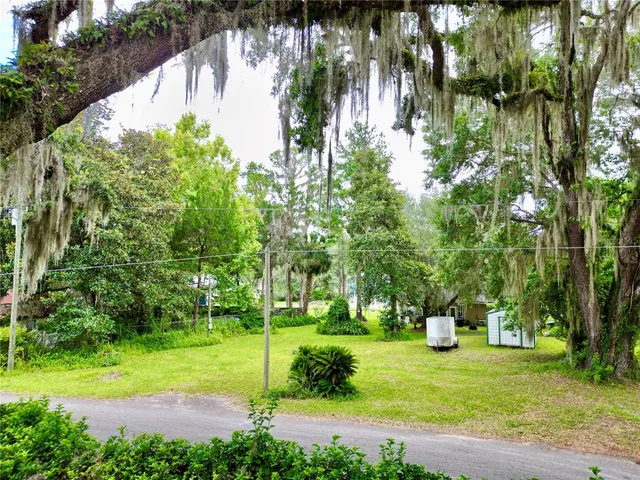 a view of a golf course with a fountain