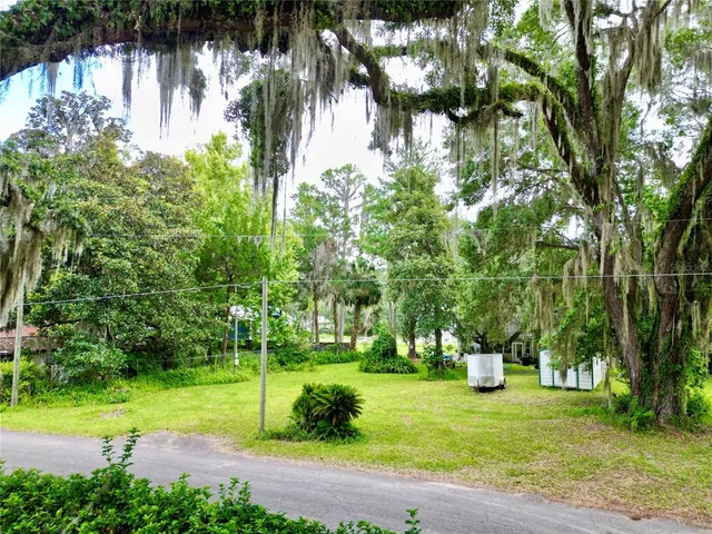 a view of a garden with a fountain