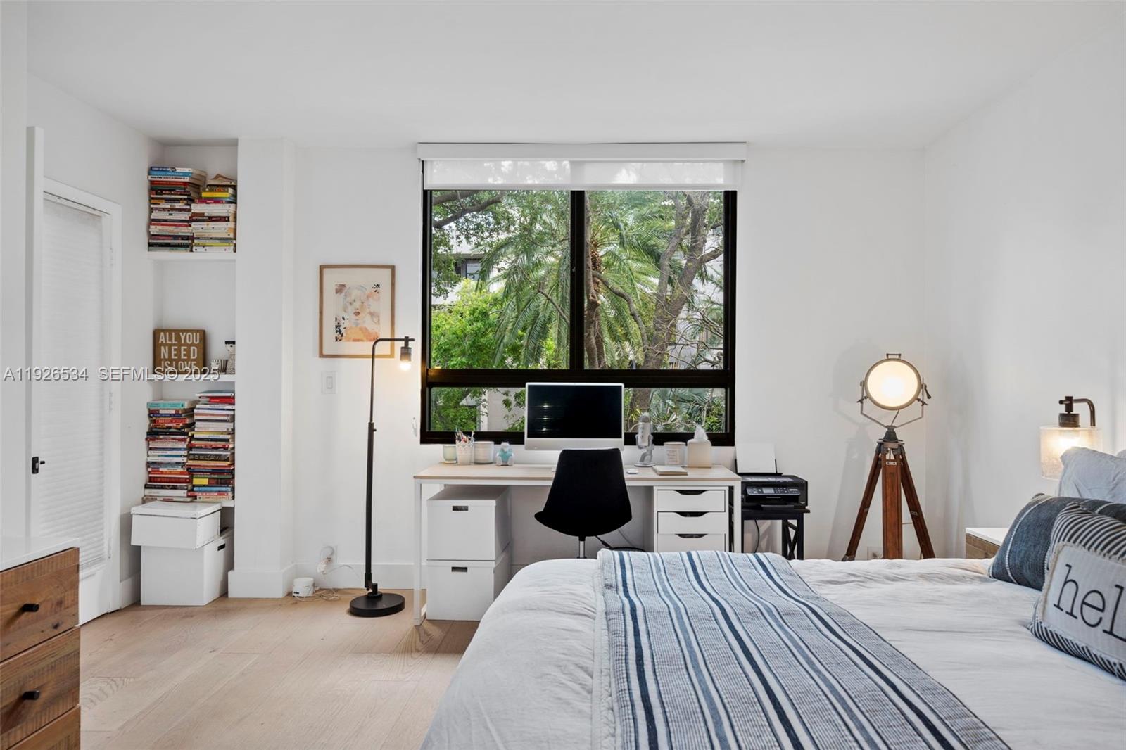 141 Crandon Boulevard, Unit 237 Key Biscayne, FL 33149 - Photo 15 of 38 a view of a workspace with furniture and a bedroom