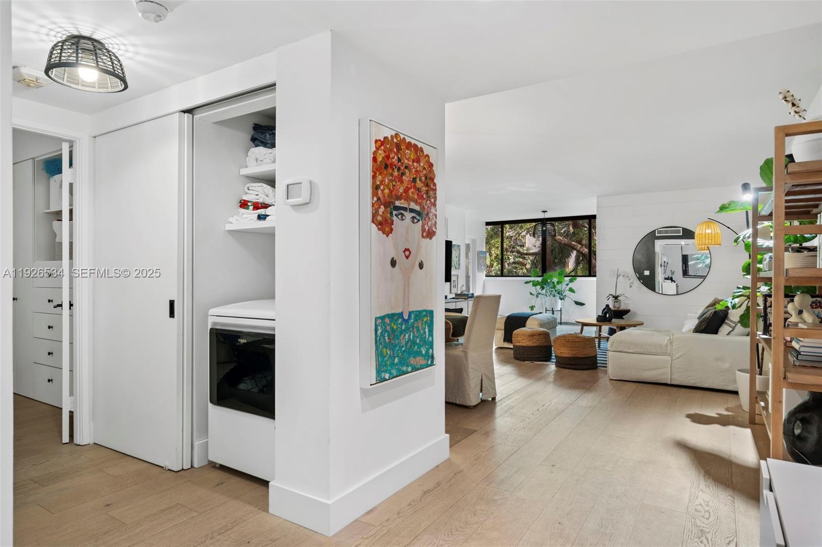 141 Crandon Boulevard, Unit 237 Key Biscayne, FL 33149 - Photo 25 of 38 a living room with furniture and a fireplace