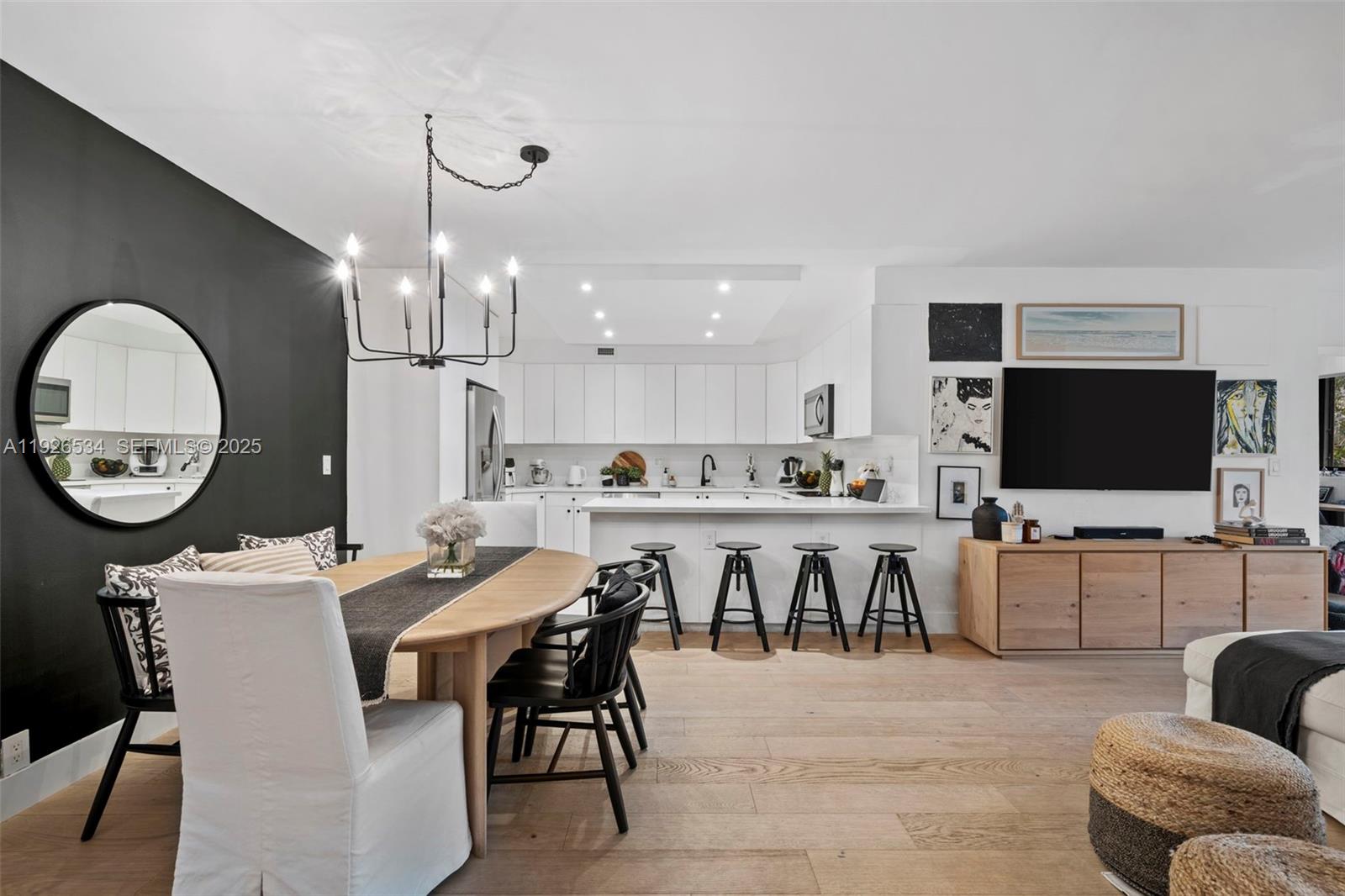 141 Crandon Boulevard, Unit 237 Key Biscayne, FL 33149 - Photo 4 of 38 a view of a dining room with furniture