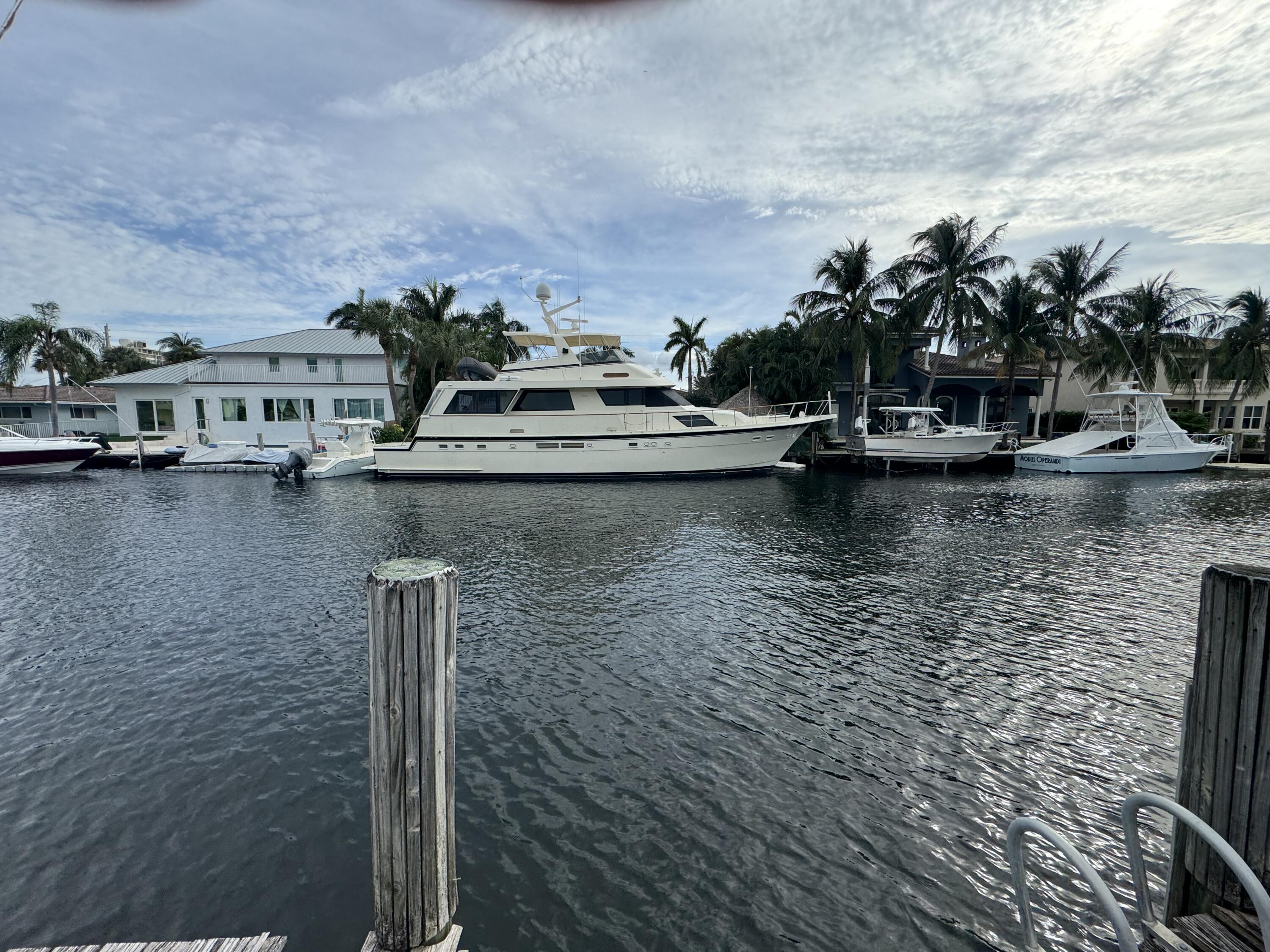 3348 Northeast 29th Avenue Lighthouse Point, FL 33064 - Photo 1 of 5 a view of a lake with houses