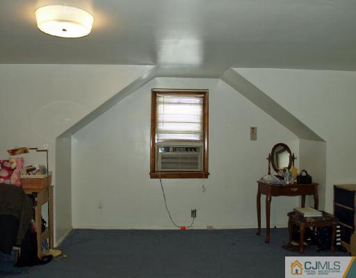 71 Middle Hill Road Colonia, NJ 07067 - Photo 7 of 10 a view of room with window and workspace