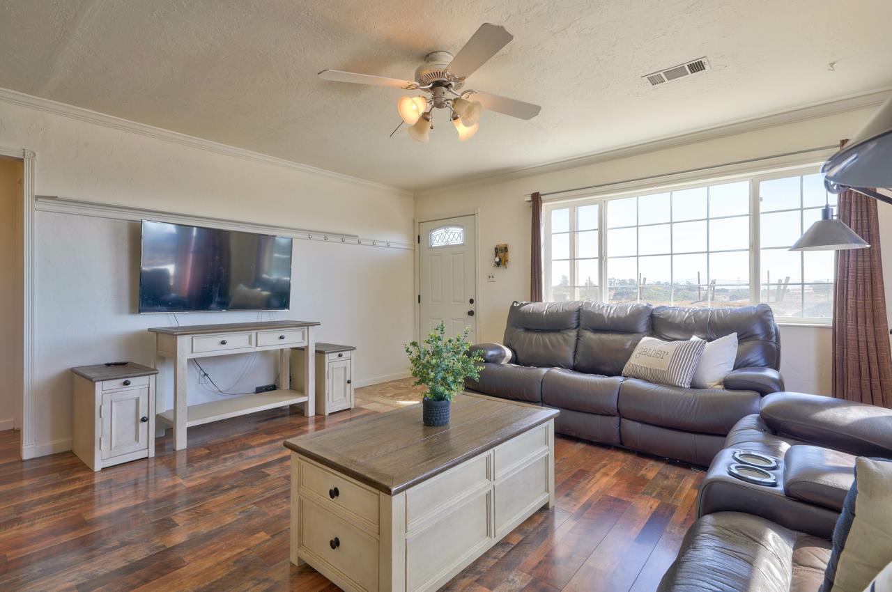 14485 Russo Road Castroville, CA 95012 - Photo 11 of 55 a living room with furniture and a flat screen tv