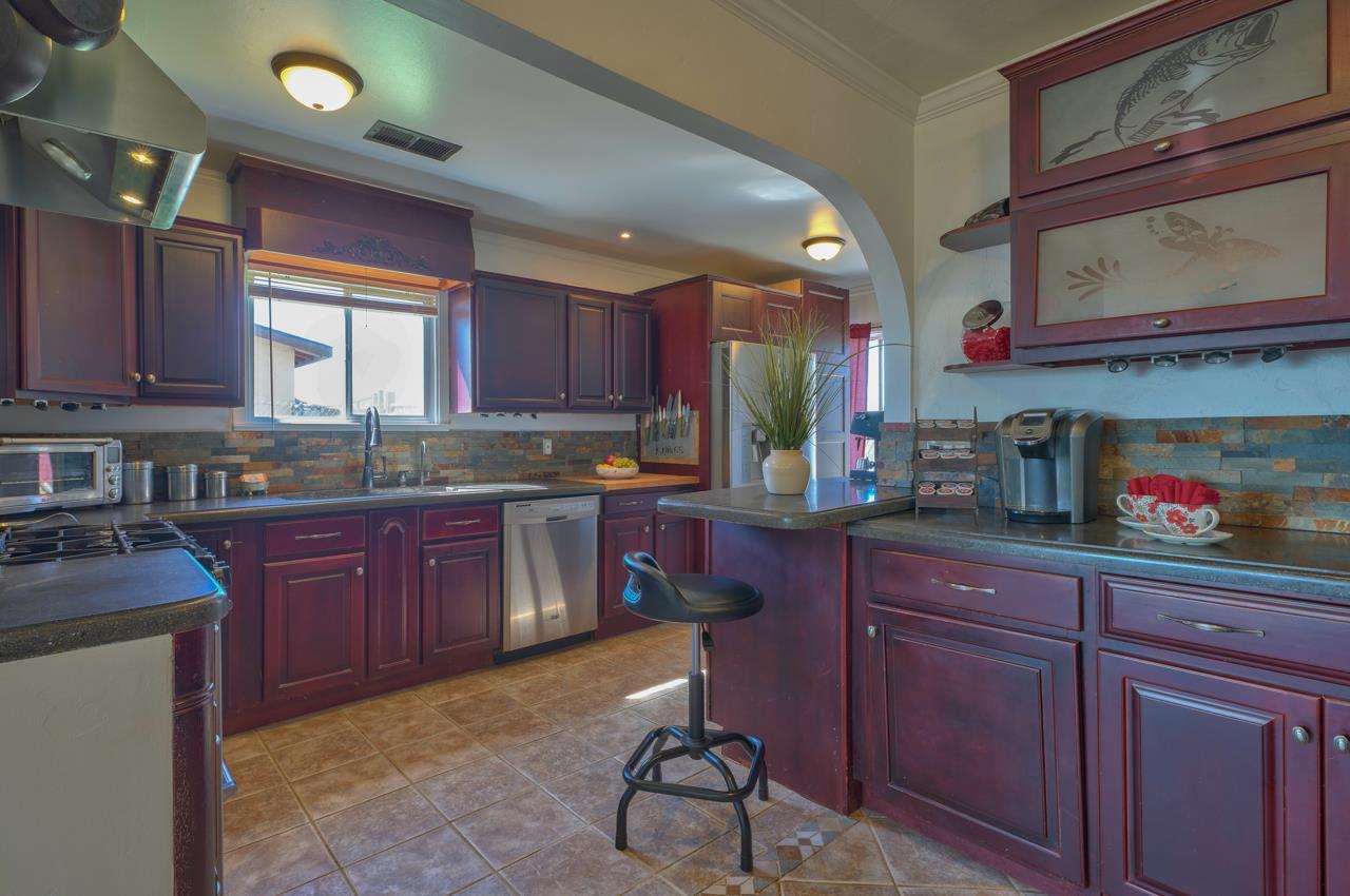14485 Russo Road Castroville, CA 95012 - Photo 13 of 55 a kitchen with a sink cabinets and window