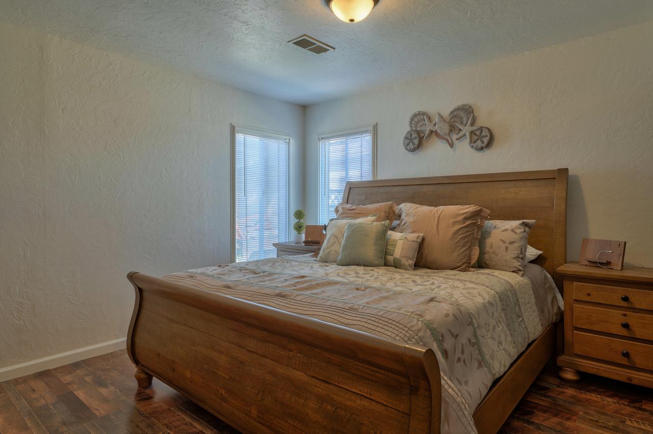 14485 Russo Road Castroville, CA 95012 - Photo 20 of 55 a bedroom with a bed and painting on the wall