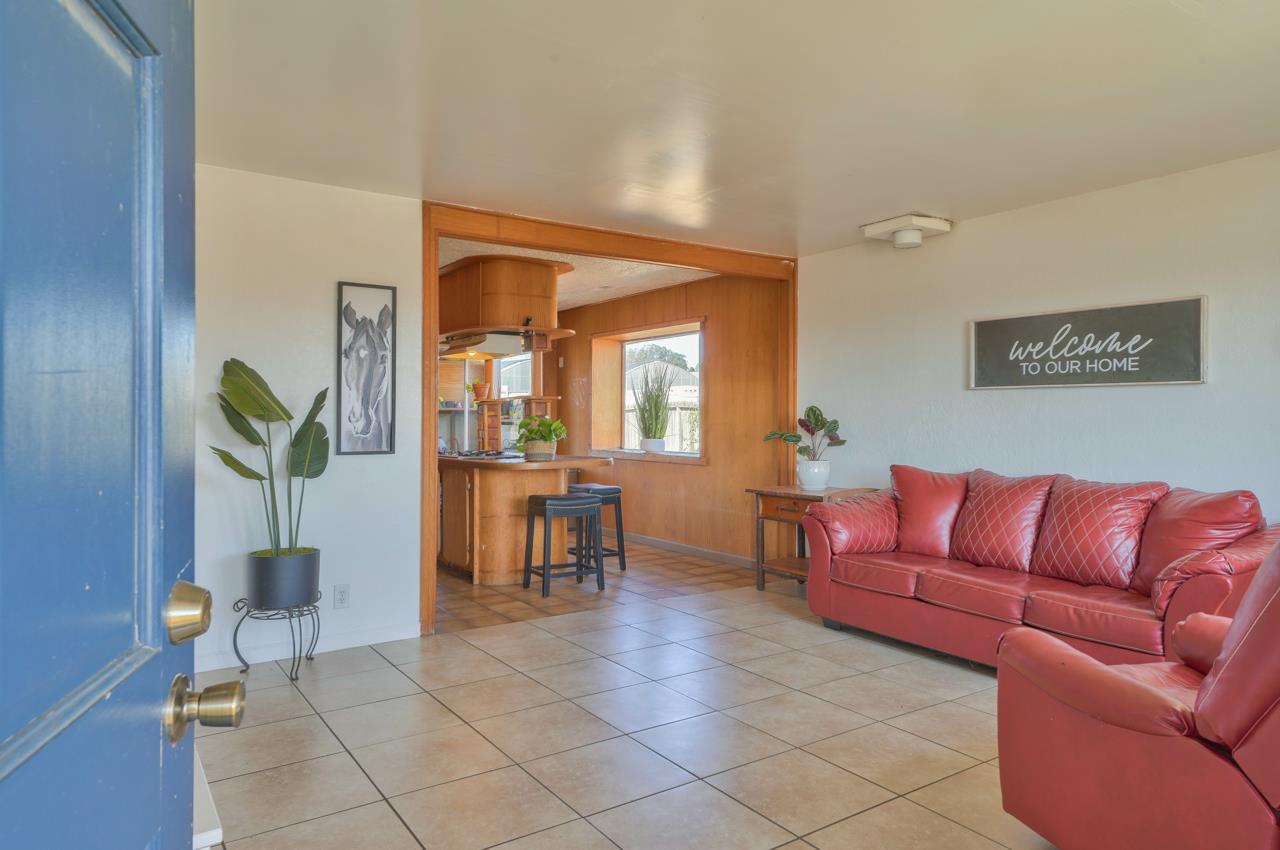 14485 Russo Road Castroville, CA 95012 - Photo 28 of 55 a living room with furniture and a dining table
