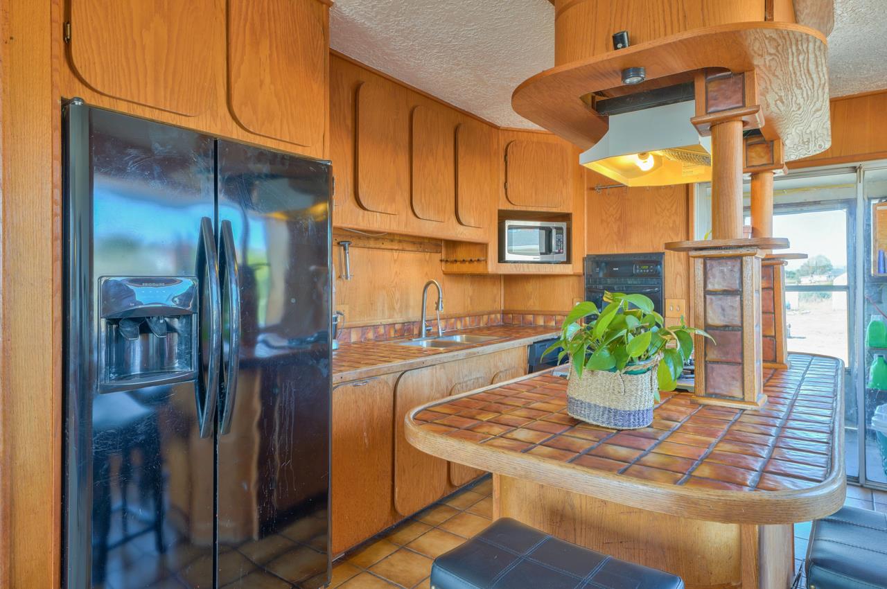 14485 Russo Road Castroville, CA 95012 - Photo 31 of 55 a view of a dining room with a table and chairs