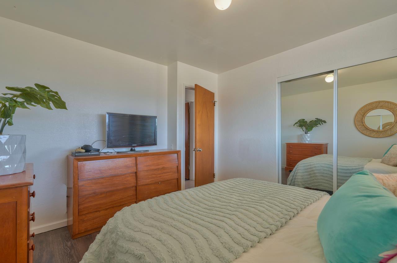 14485 Russo Road Castroville, CA 95012 - Photo 37 of 55 a bedroom with a bed and a flat screen tv