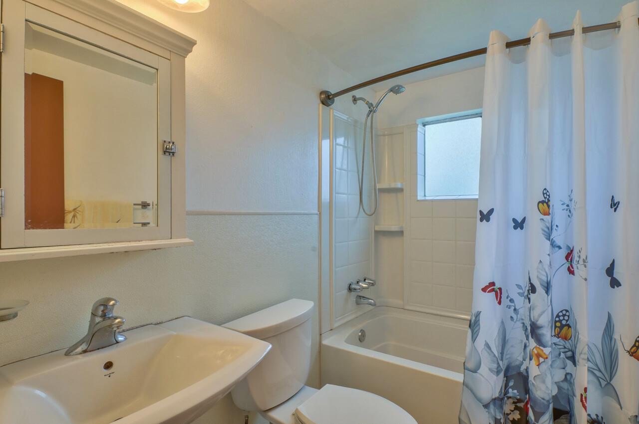 14485 Russo Road Castroville, CA 95012 - Photo 48 of 55 a bathroom with a sink toilet and shower