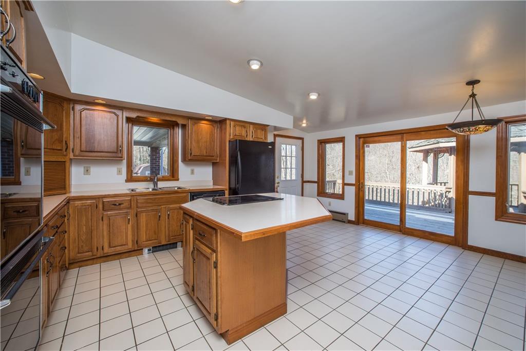 4138 Battle Ridge Road McDonald, PA 15057 - Photo 8 of 25 With east access to the deck, al fresco dining is a breeze!