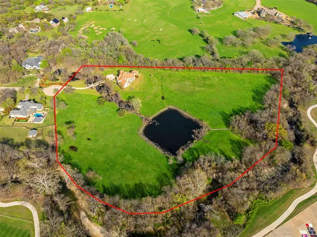 a view of a garden with a lake