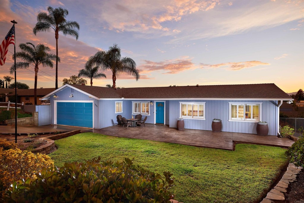 a house view with a garden space