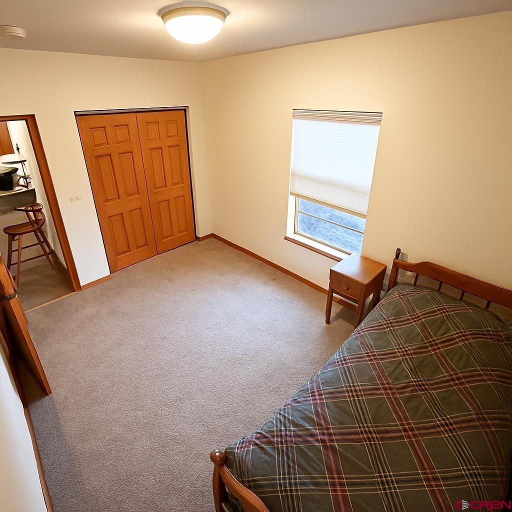 235 North Chestnut Street, Unit 6 Cortez, CO 81321 - Photo 8 of 17 a view of workspace with wooden floor and window