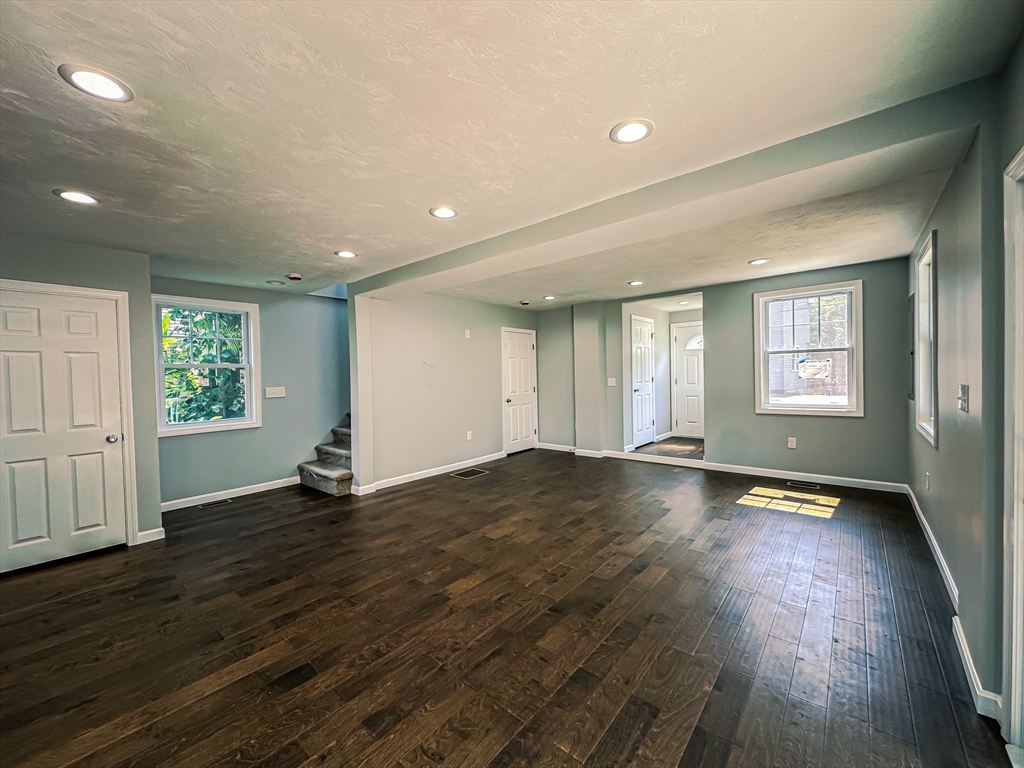 14 Hillside Road Northborough, MA 01532 - Photo 13 of 13 an empty room with wooden floor and windows