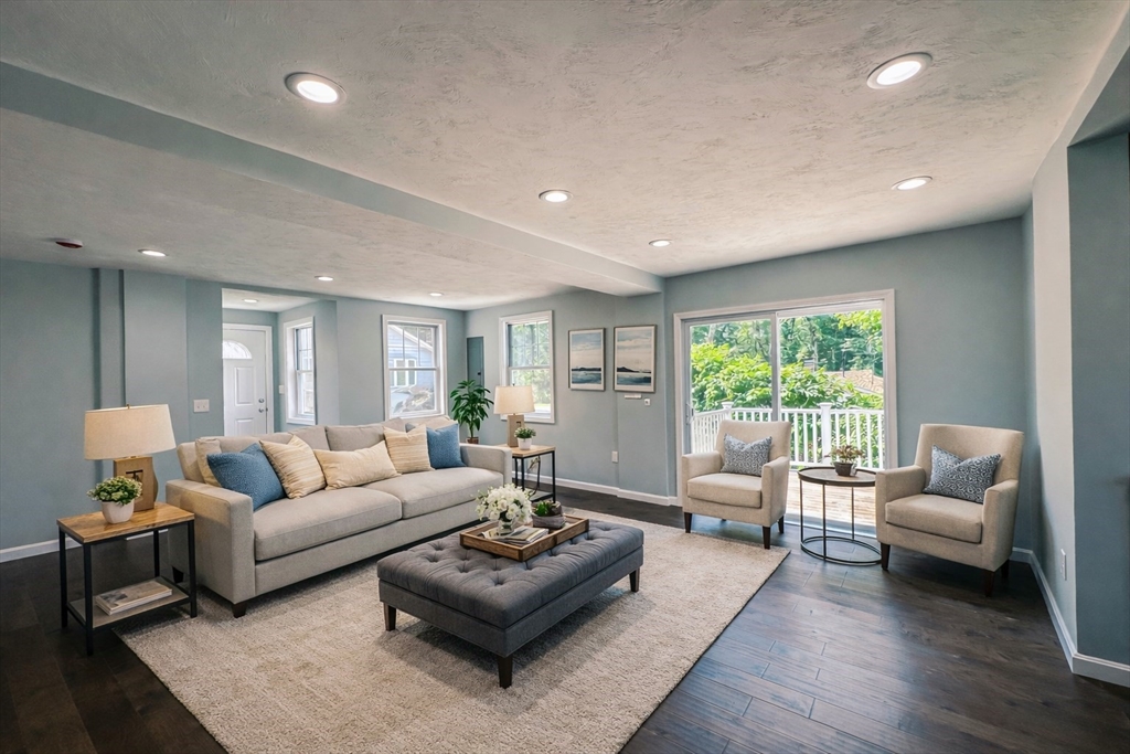 14 Hillside Road Northborough, MA 01532 - Photo 10 of 13 a living room with furniture and a large window