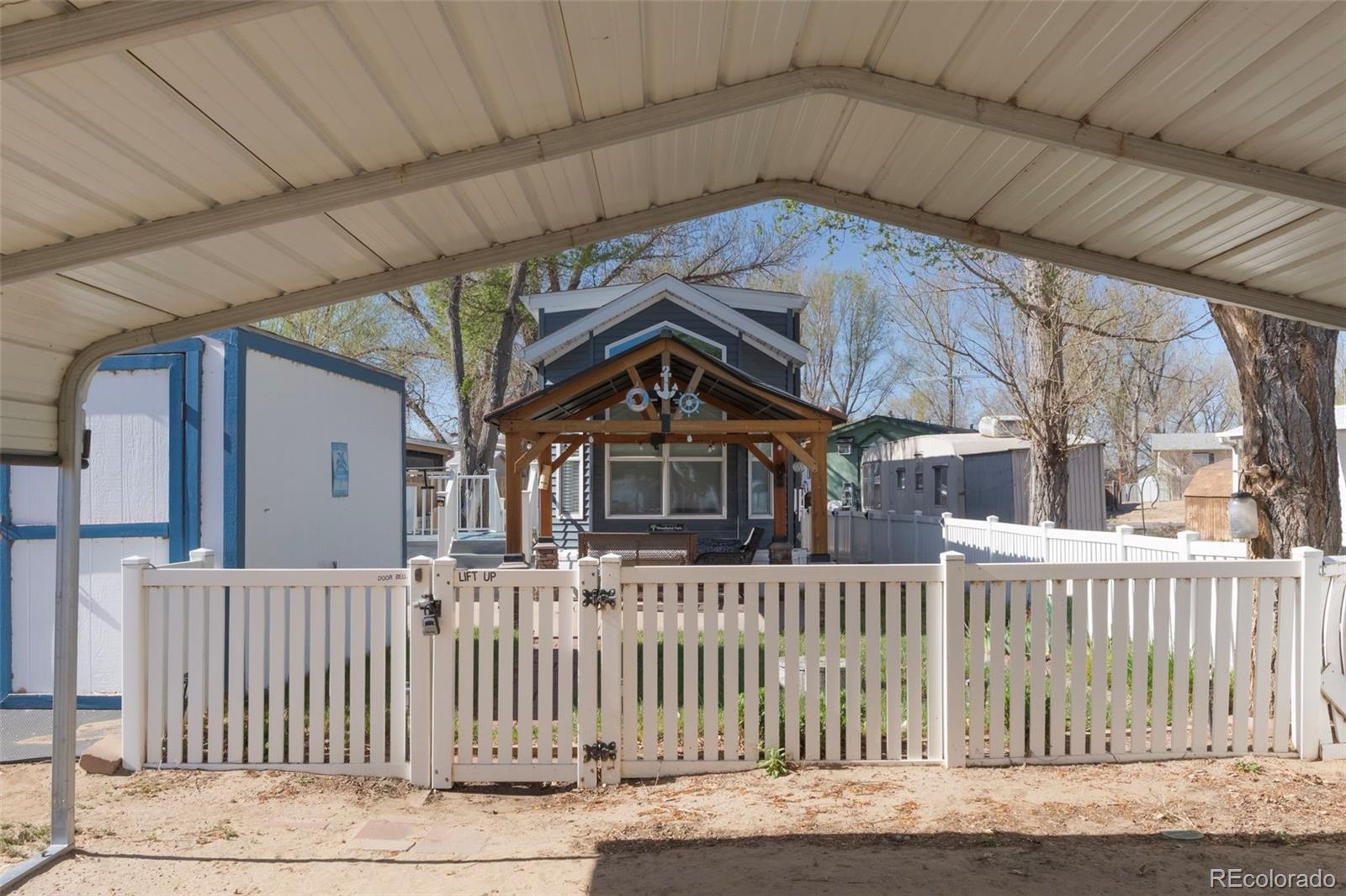 188 Kiowa Road Weldona, CO 80653 - Photo 14 of 34 a front view of a house