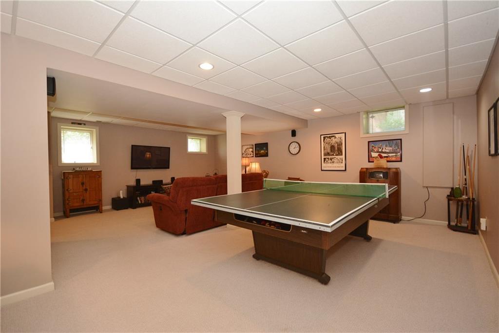 1436 Reissing Road McDonald, PA 15057 - Photo 22 of 25 Spacious Lower Level game room, nice and light with windows, recessed lighting and neutral carpeting~
