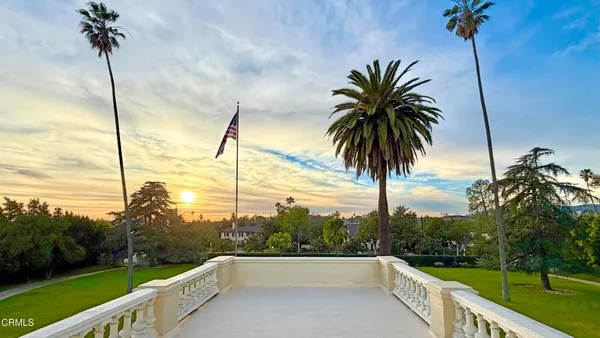 a view of swimming pool having outdoor seating