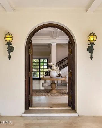 a view of hall way with fireplace