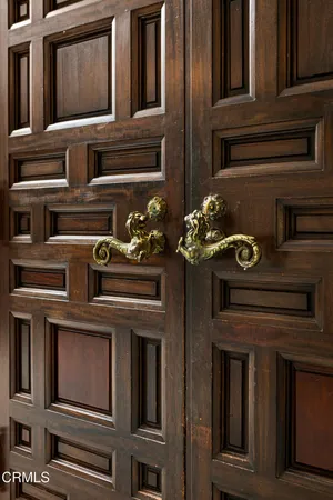 a kitchen with a stove and cabinets