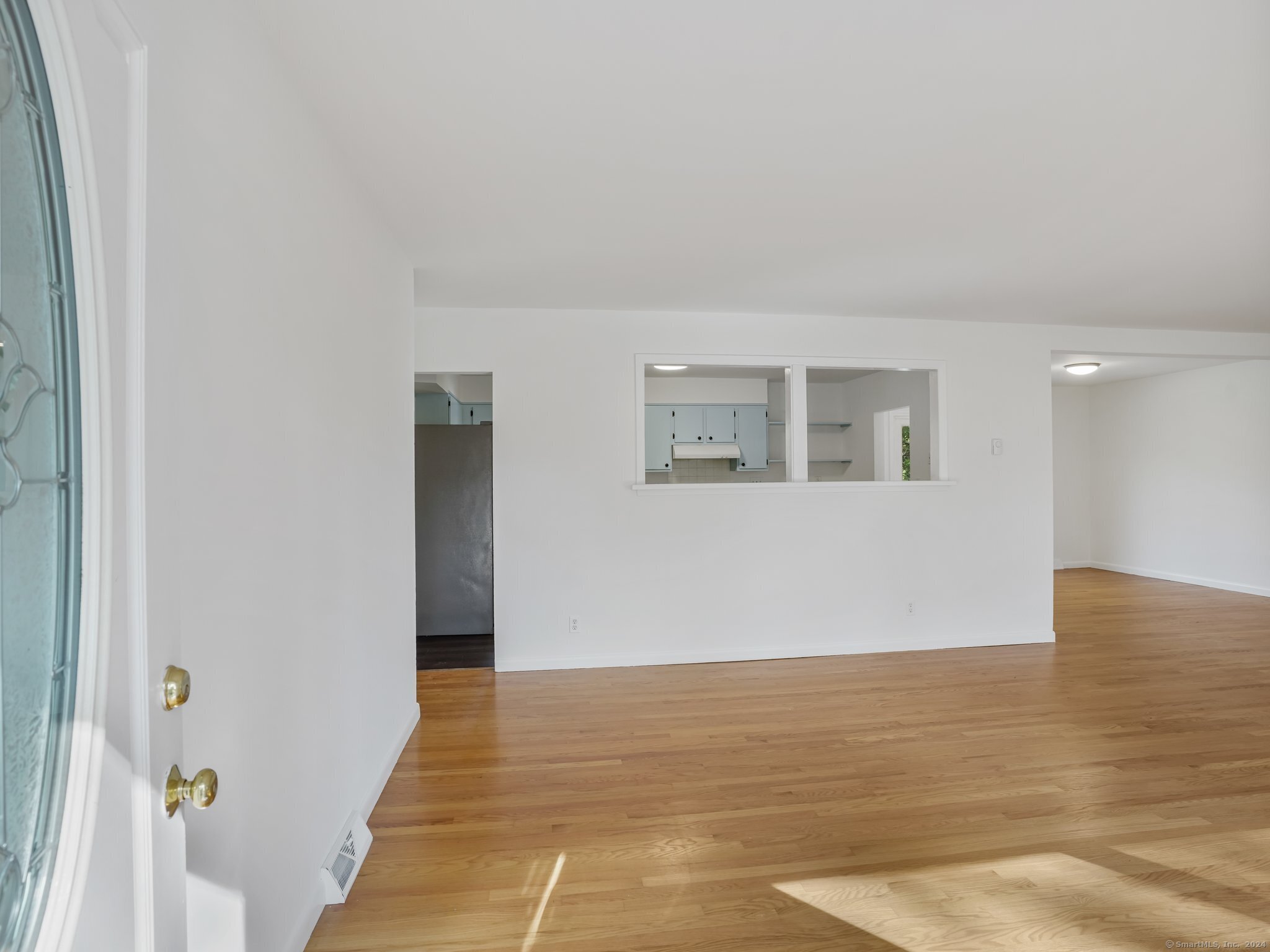 488 Sport Hill Road Easton, CT 06612 - Photo 3 of 32 a view of an empty room with wooden floor