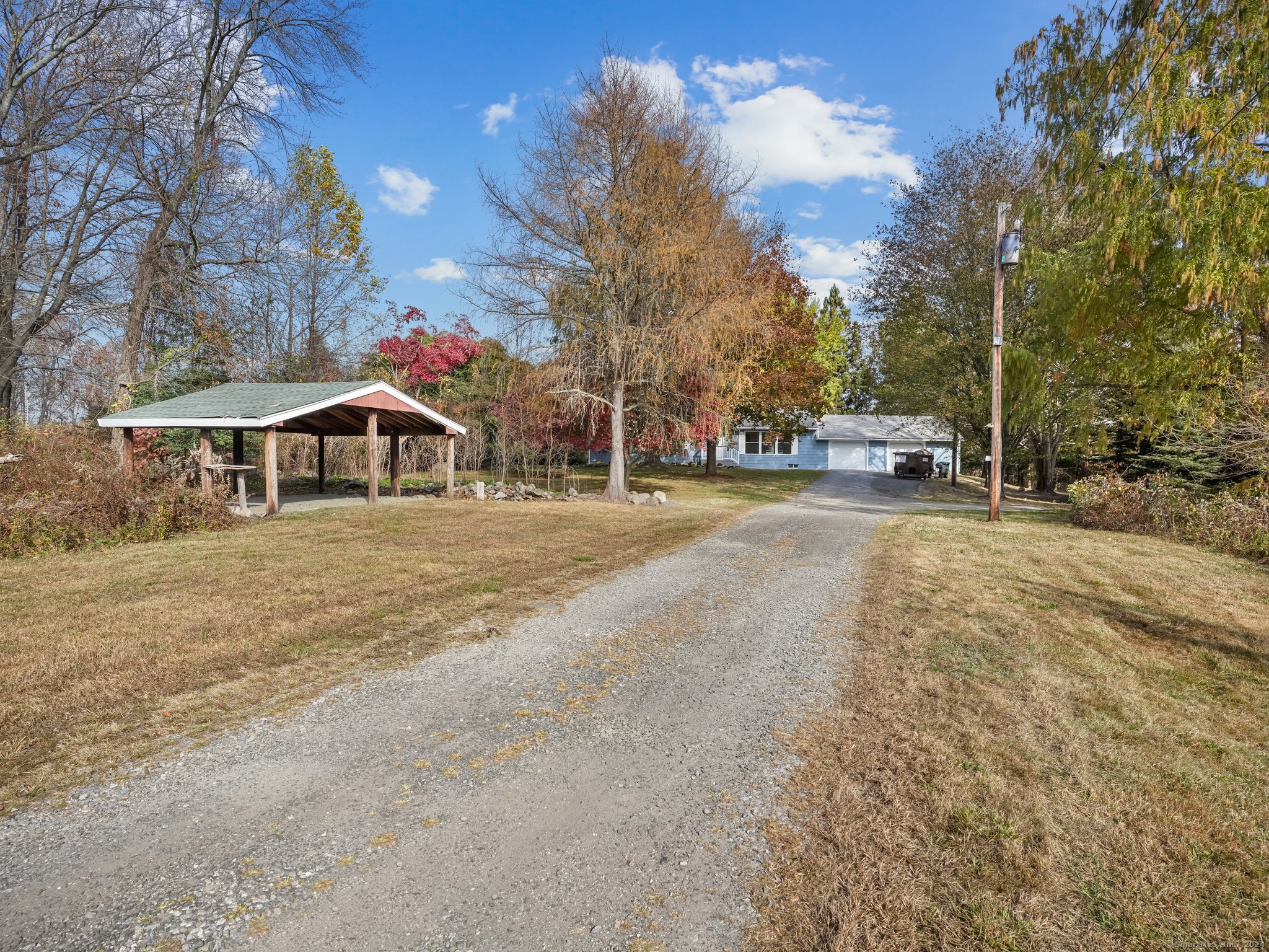 488 Sport Hill Road Easton, CT 06612 - Photo 31 of 32 a view of a town with large trees