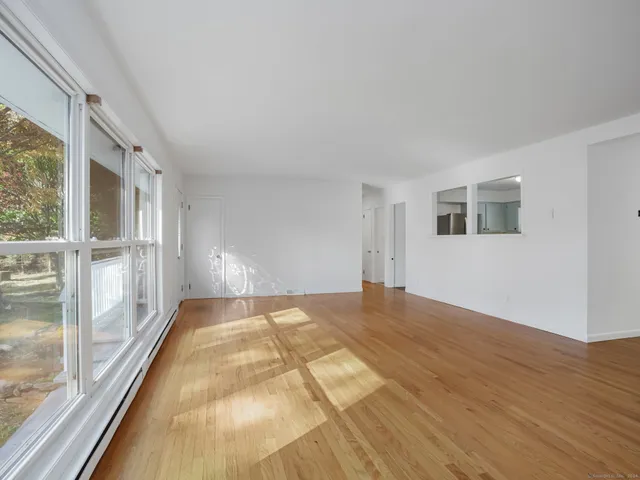 a view of an empty room and window