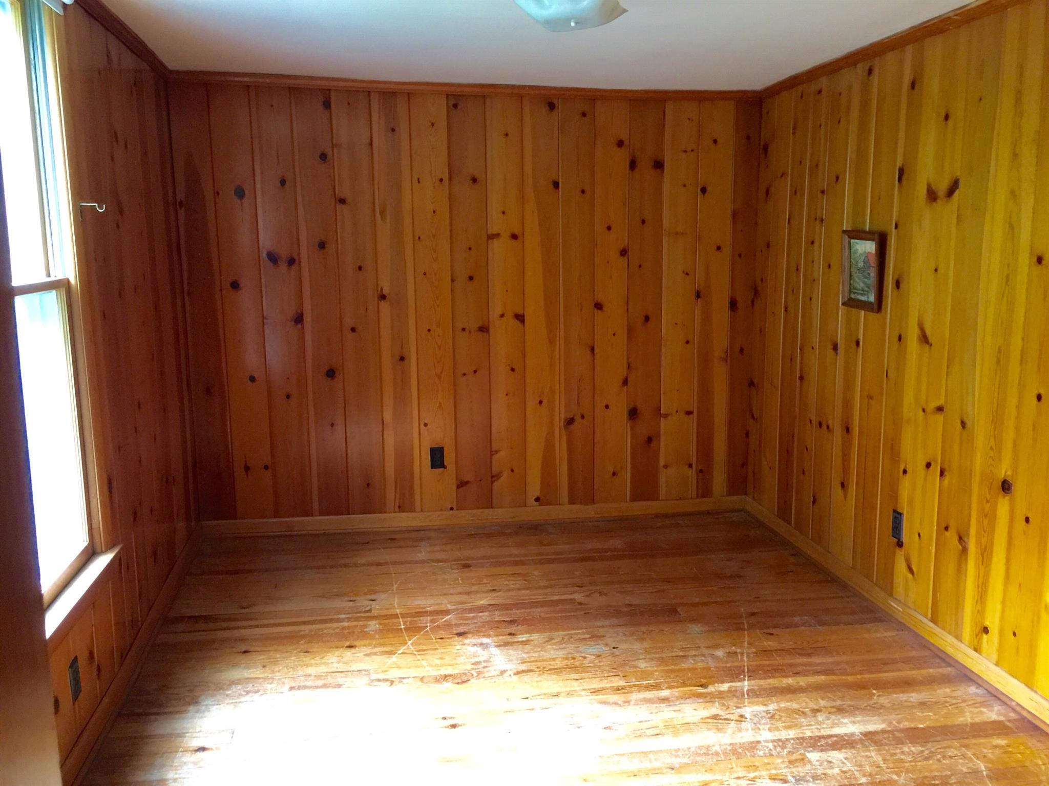 128 East Campbell Road Madison, TN 37115 - Photo 19 of 26 Second bedroom upstairs. Partially Open door is to the walk in attic space.