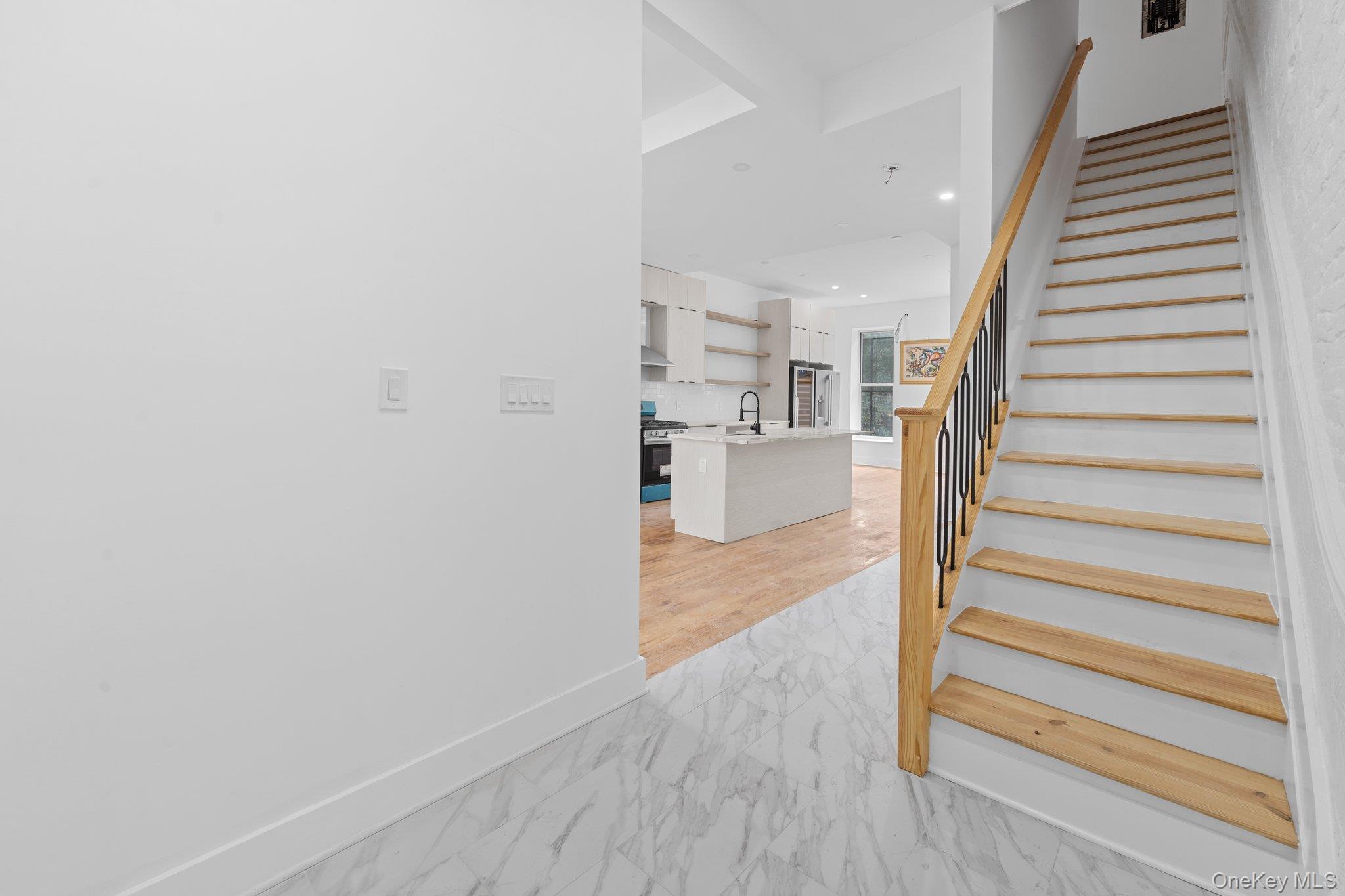 614 Madison Street Brooklyn, NY 11221 - Photo 4 of 14 a view of entryway and hall with wooden floor