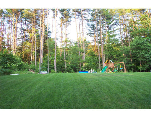 10 Edward Road Townsend, MA 01469 - Photo 8 of 11 a backyard of a house with lots of green space