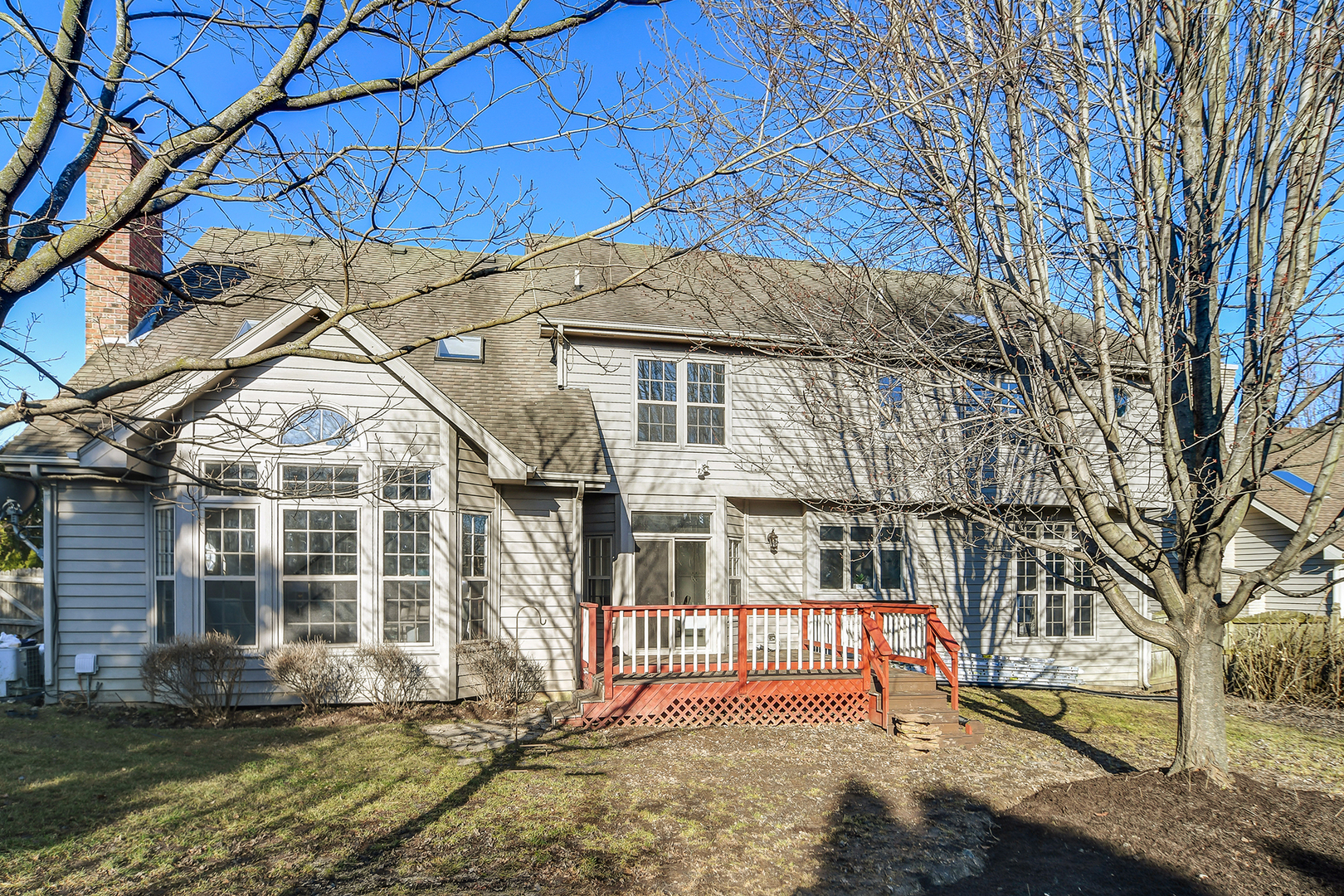 2116 Keim Road Naperville, IL 60565 - Photo 17 of 18 a view of a house with a yard