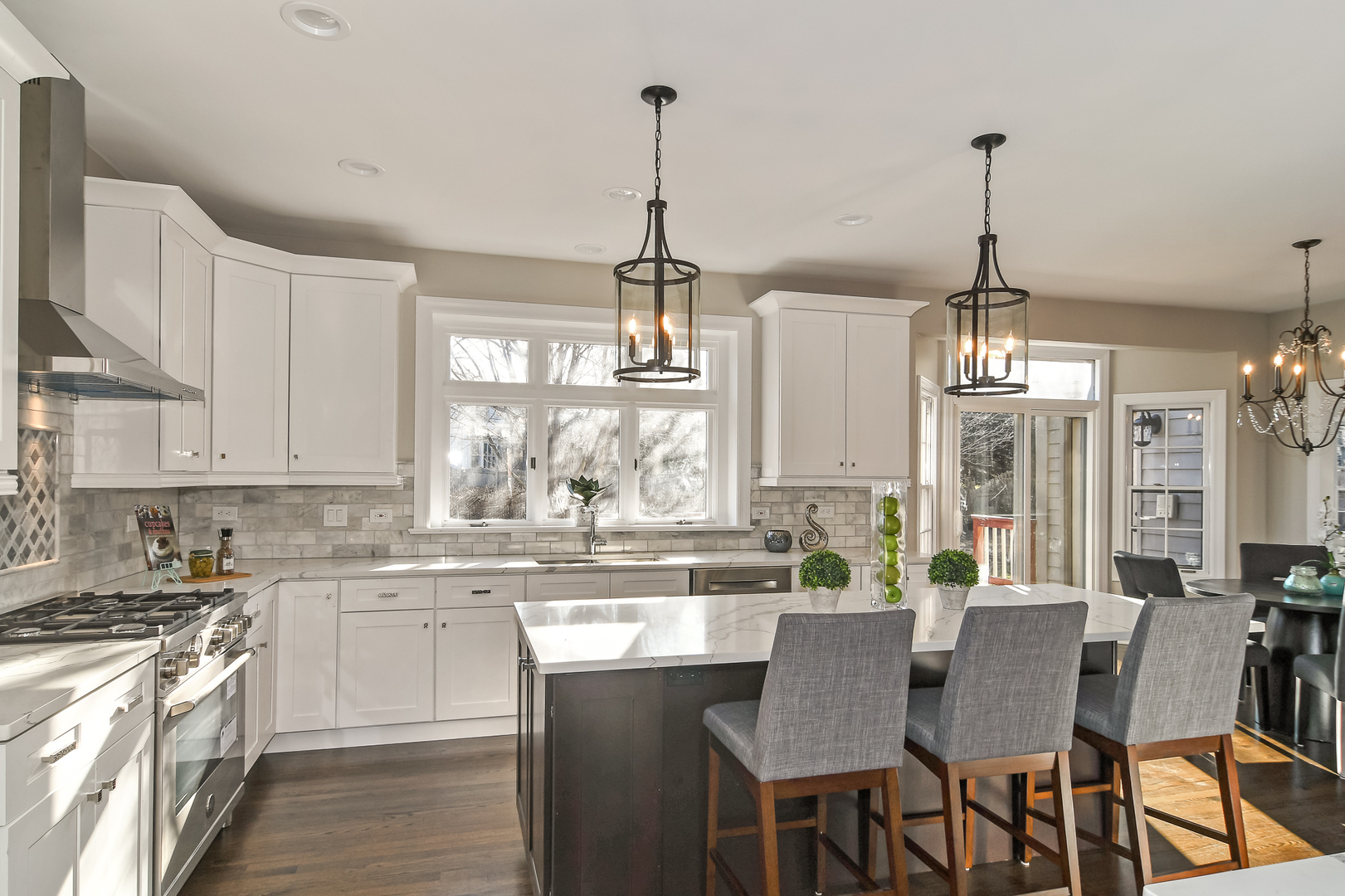 2116 Keim Road Naperville, IL 60565 - Photo 5 of 18 a kitchen with stainless steel appliances granite countertop a stove top oven a sink dishwasher a dining table and chairs with wooden floor