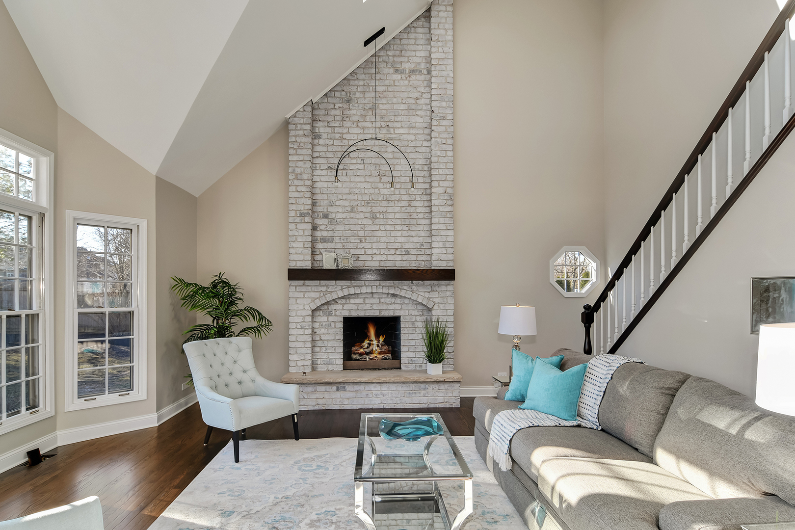 2116 Keim Road Naperville, IL 60565 - Photo 8 of 18 a living room with furniture and a fireplace