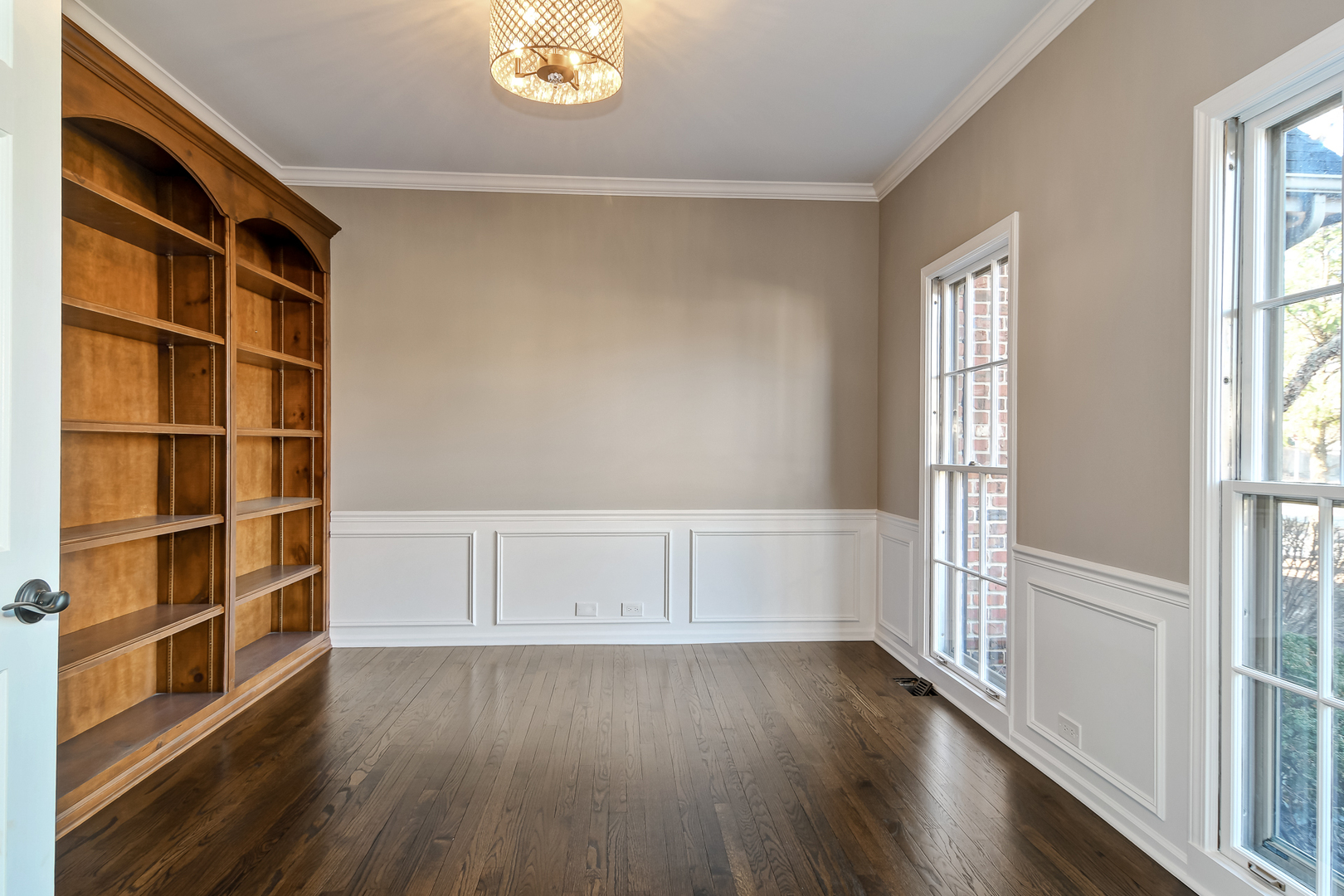 2116 Keim Road Naperville, IL 60565 - Photo 9 of 18 an empty room with wooden floor and windows