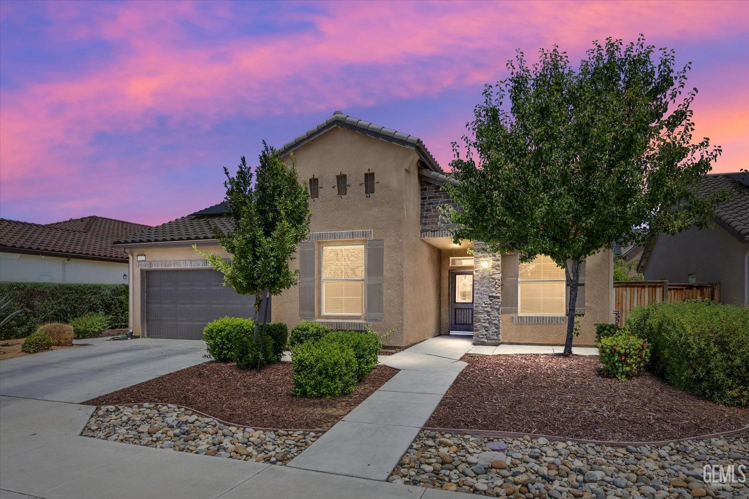 Undisclosed Address Shafter, CA 93263 - Photo 1 of 29 a front view of a house with a yard