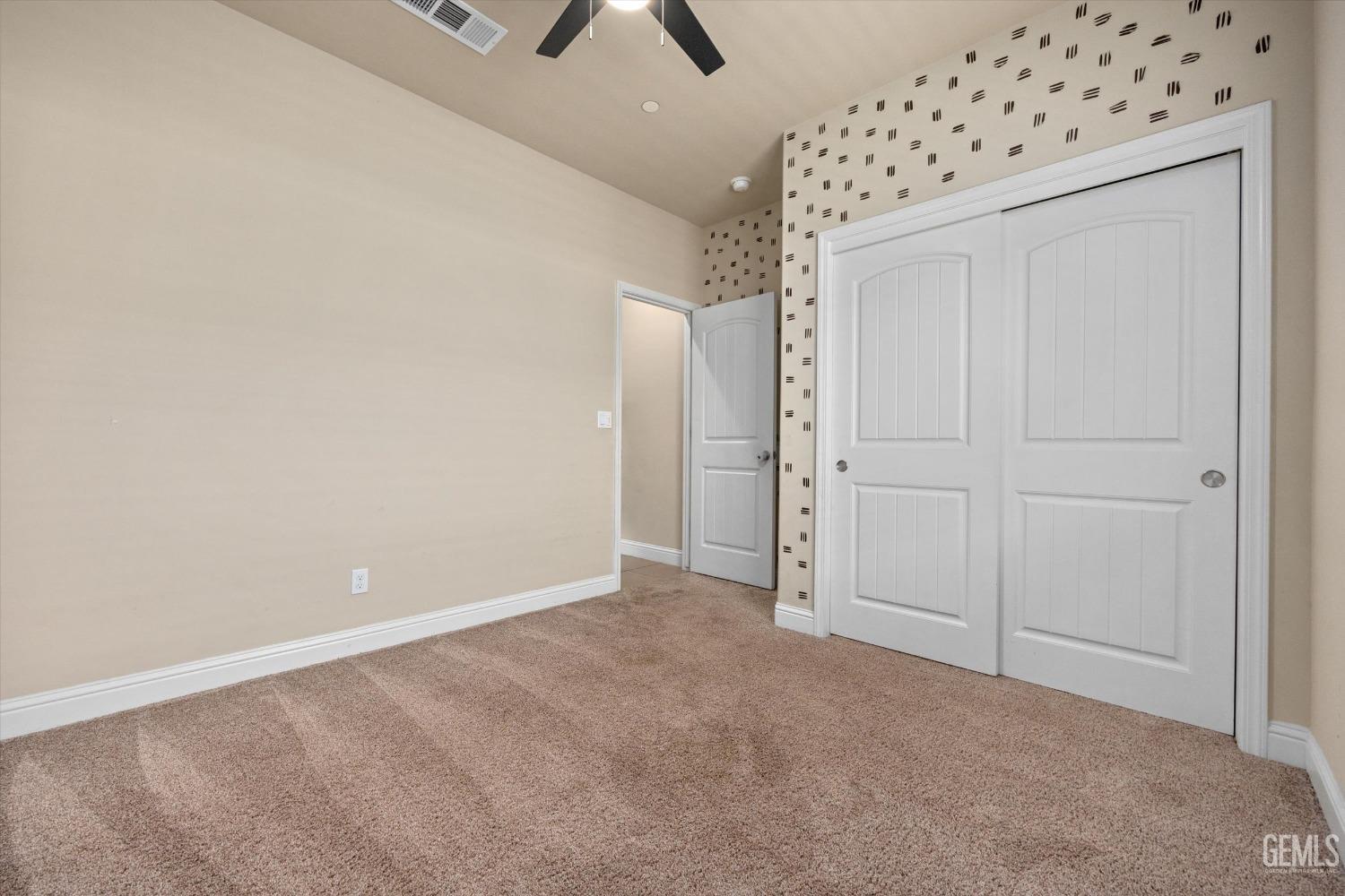 Undisclosed Address Shafter, CA 93263 - Photo 18 of 29 an empty room with a hallway