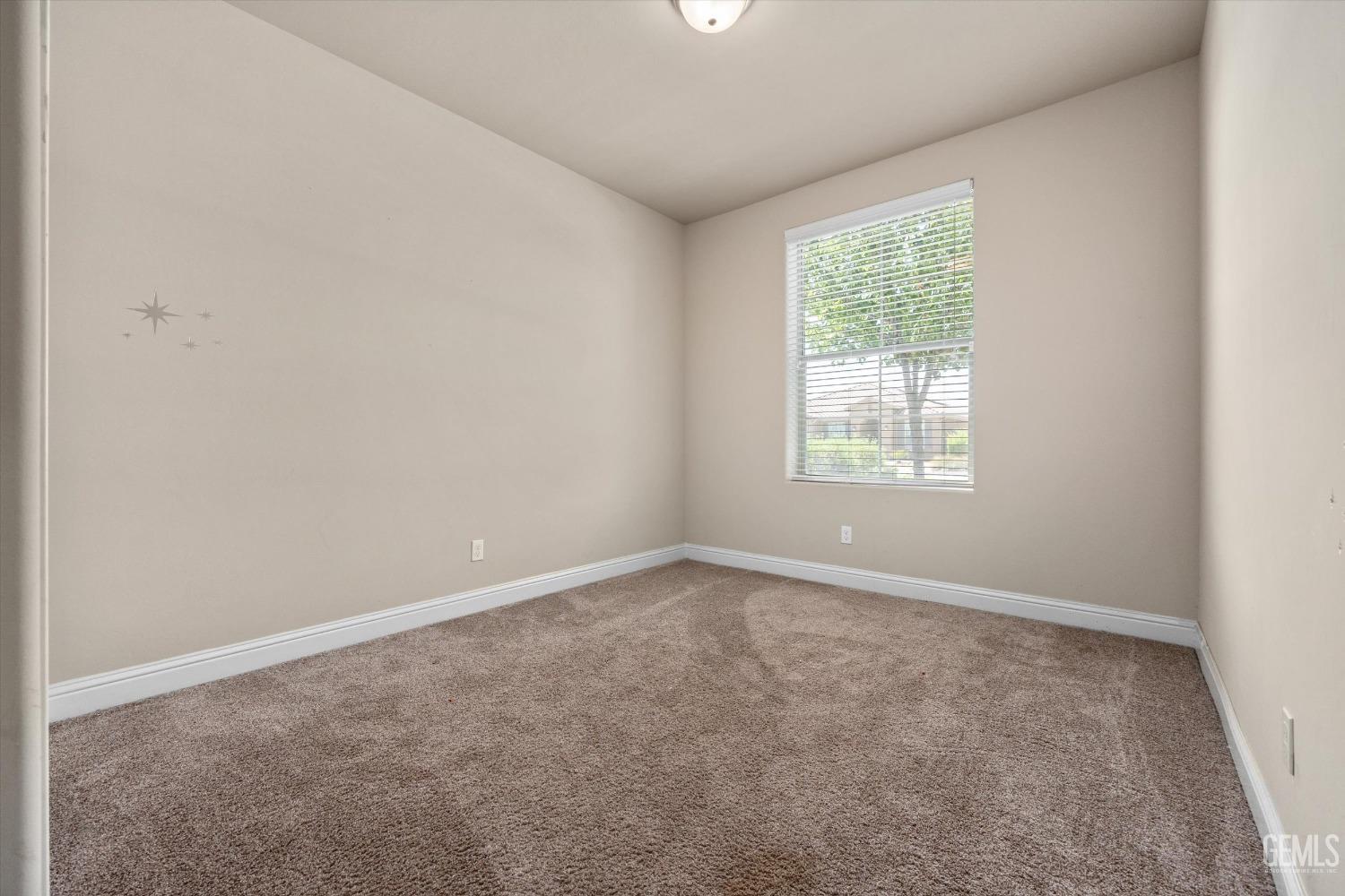 Undisclosed Address Shafter, CA 93263 - Photo 22 of 29 an empty room with a window