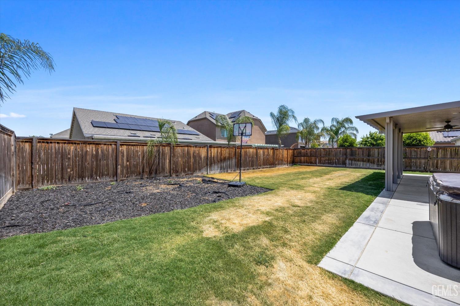 Undisclosed Address Shafter, CA 93263 - Photo 29 of 29 a view of a backyard with trampoline