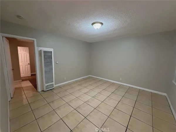a view of a room & utility room