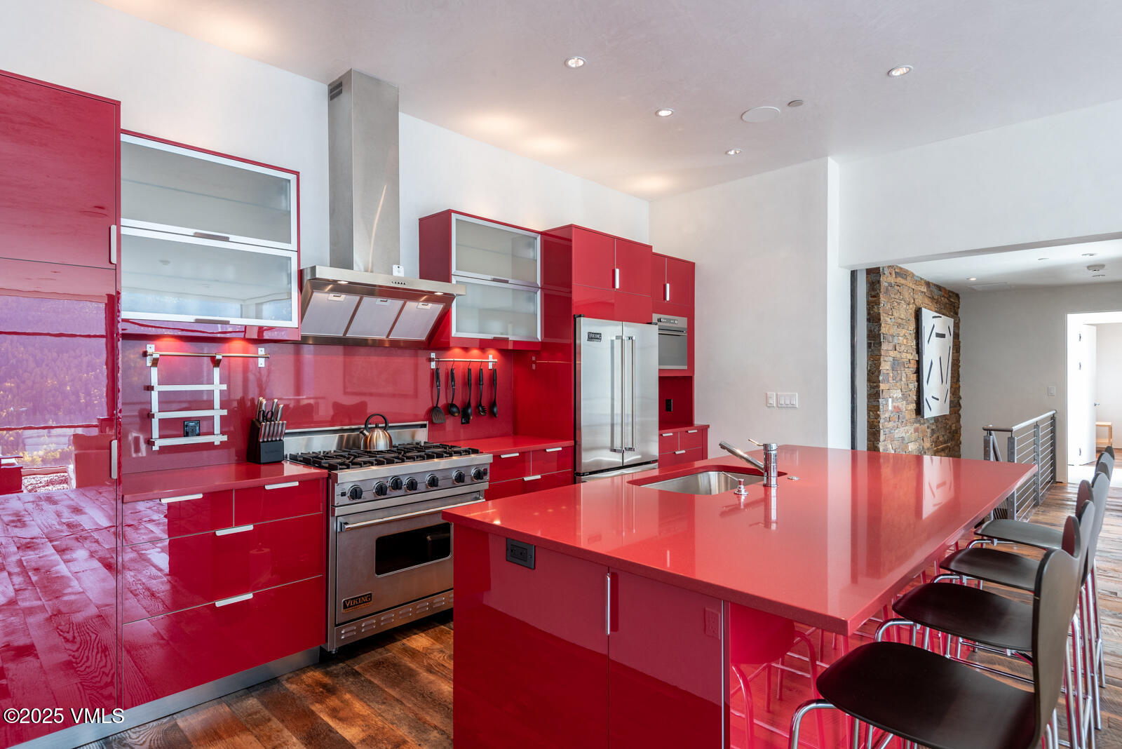 1449 Buffehr Creek Road Vail, CO 81657 - Photo 11 of 41 a kitchen with stainless steel appliances granite countertop a stove a sink and a refrigerator
