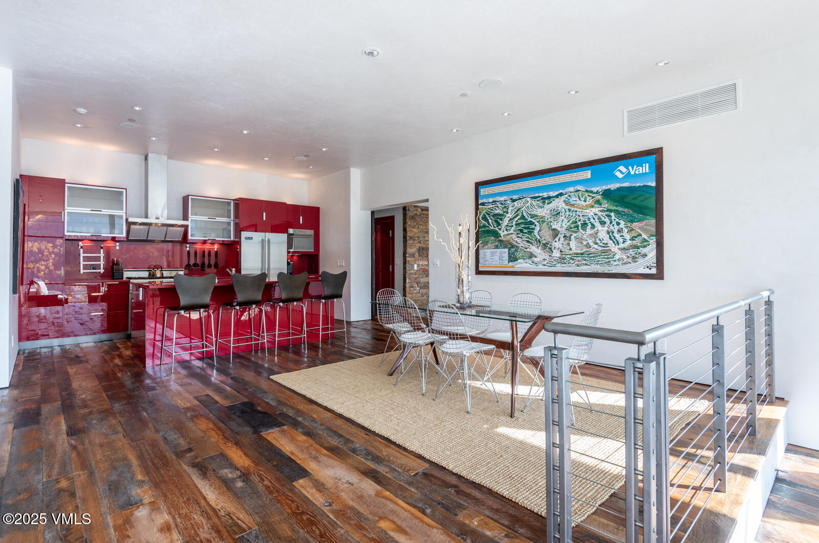 1449 Buffehr Creek Road Vail, CO 81657 - Photo 16 of 41 a living room with lots of furniture and kitchen view