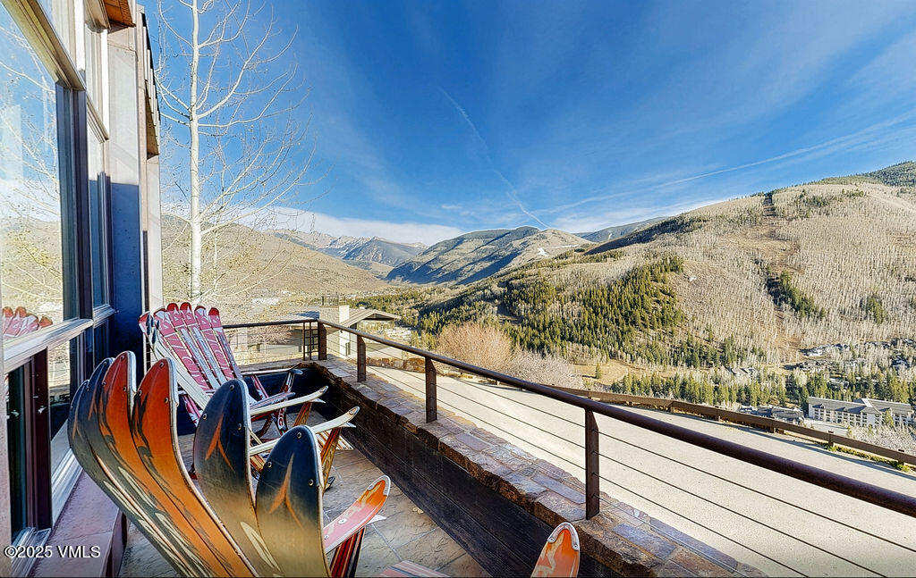 1449 Buffehr Creek Road Vail, CO 81657 - Photo 35 of 41 a view of a balcony with furniture and floor