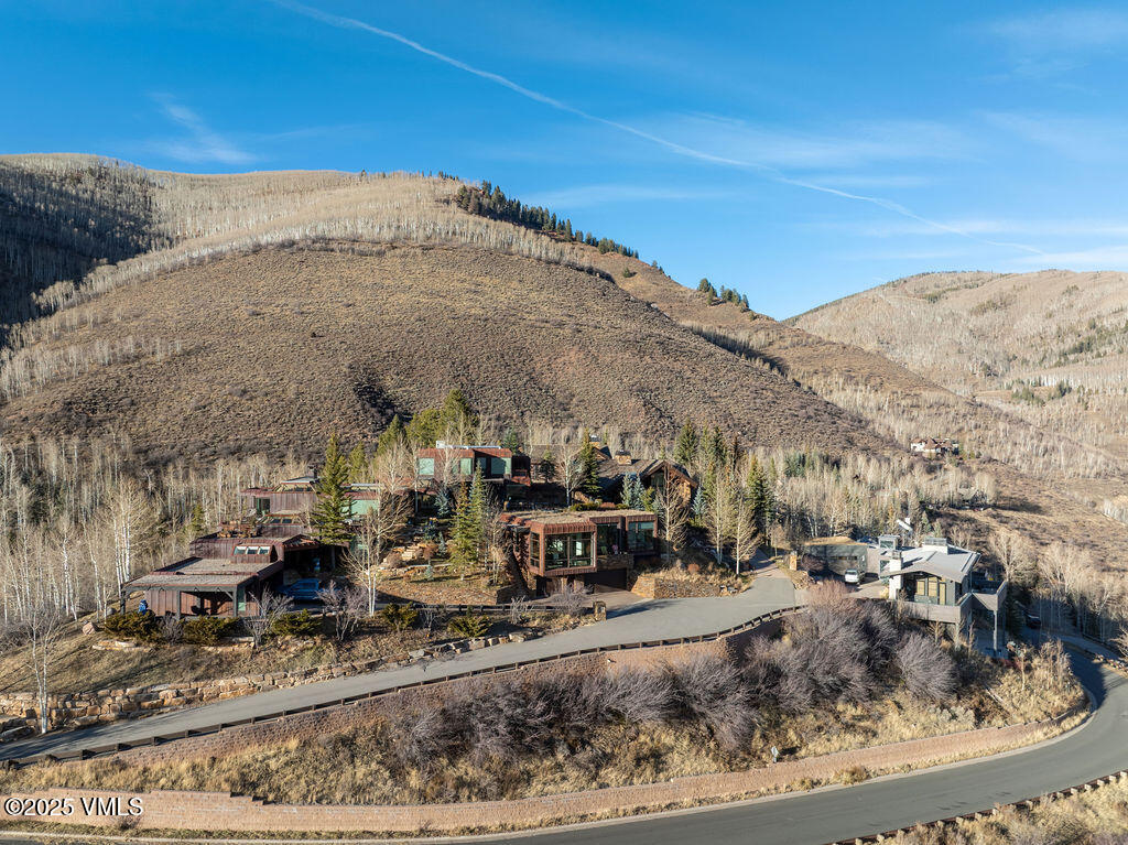 1449 Buffehr Creek Road Vail, CO 81657 - Photo 38 of 41 a view of a town with mountains in the background