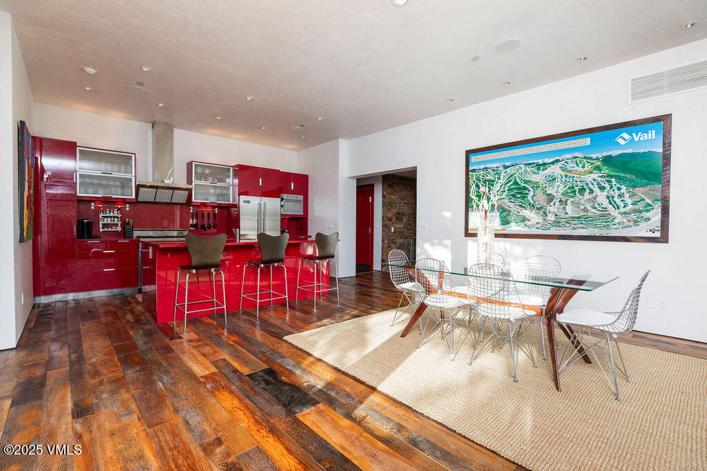 1449 Buffehr Creek Road Vail, CO 81657 - Photo 8 of 41 a view of a living room and dining room