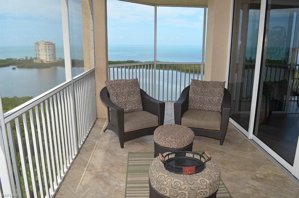 5550 Heron Point Drive, Unit 1804 Naples, FL 34108 - Photo 4 of 17 a view of a hallway with chairs