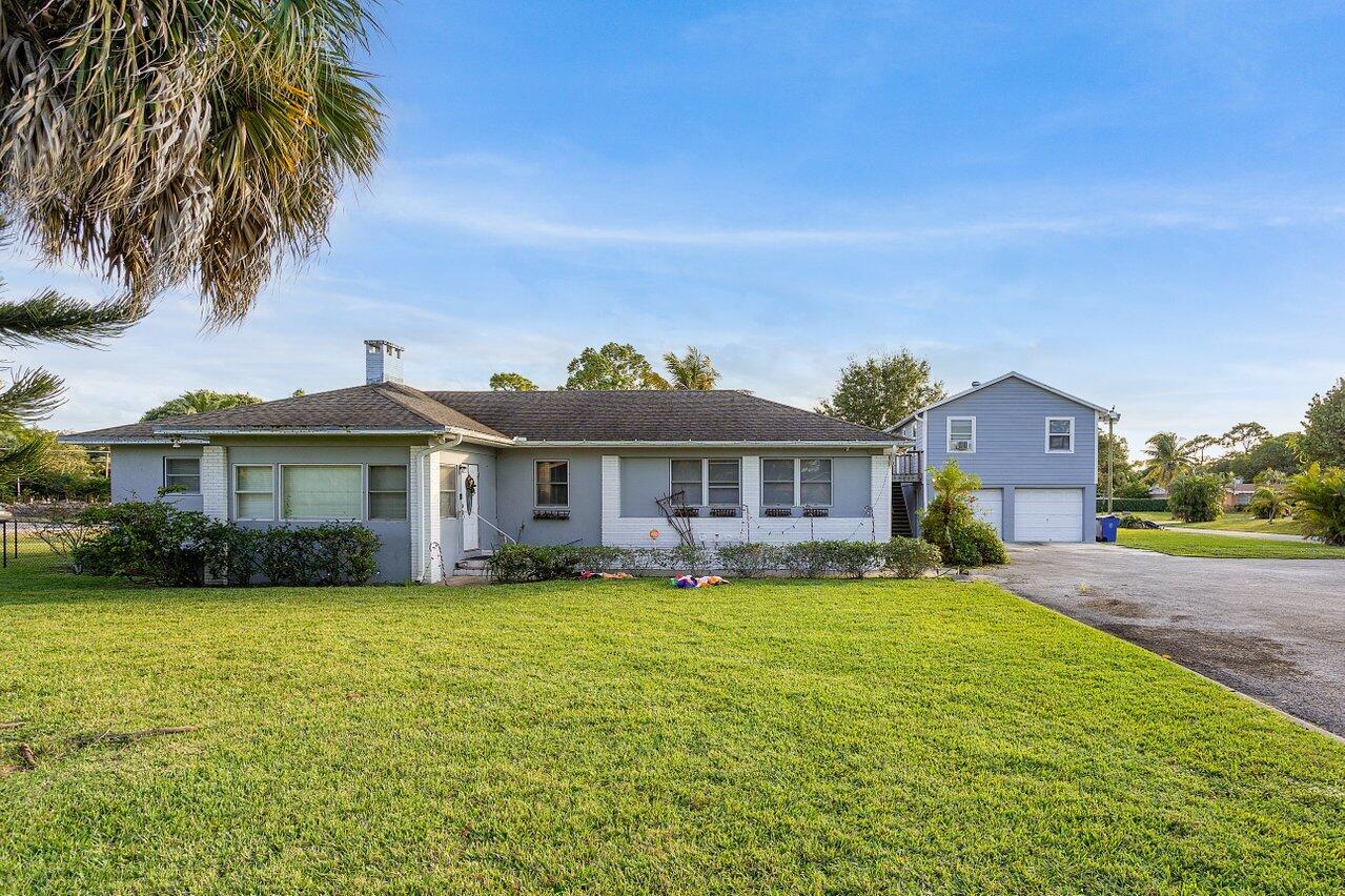 5262 Club Road Haverhill, FL 33415 - Photo 2 of 27 001-5262ClubRoad-Haverhill-FL-33415-SMAL