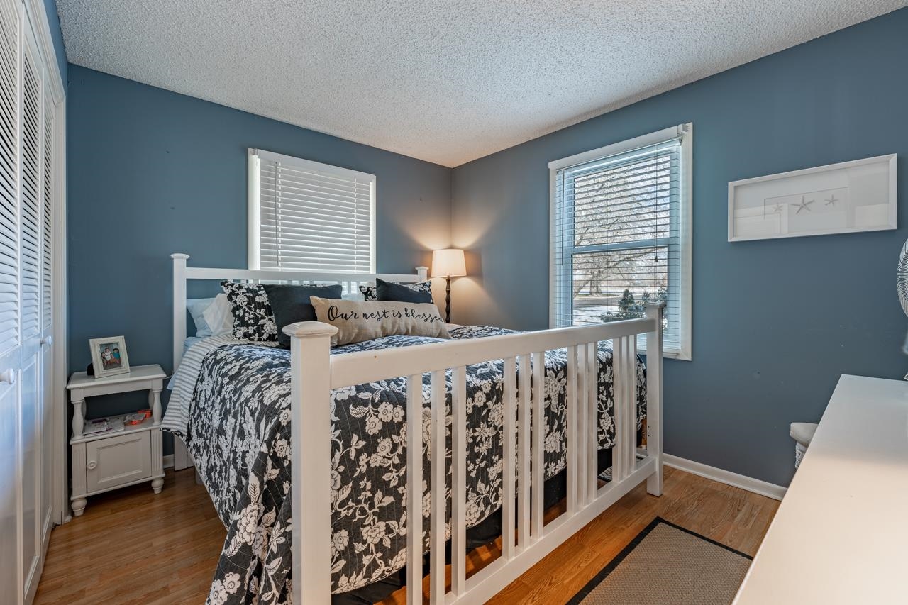 1435 Pier Drive Lake Summerset, IL 61019 - Photo 12 of 35 a large bed sitting in a bedroom next to a window