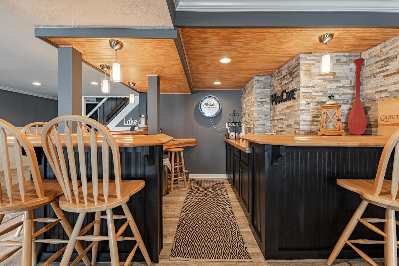 1435 Pier Drive Lake Summerset, IL 61019 - Photo 25 of 35 a dining room with furniture and a rug